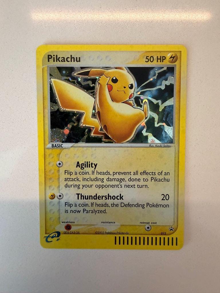 Pikachu Holo #12 Promo proxy card, not real novelty